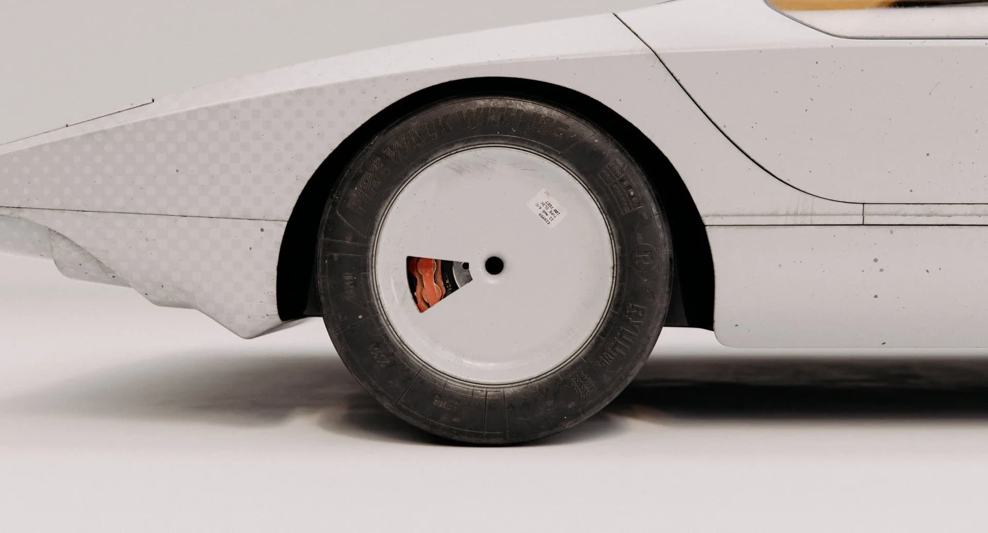 CALIBAN — carabo_car-white_001_studio_tire